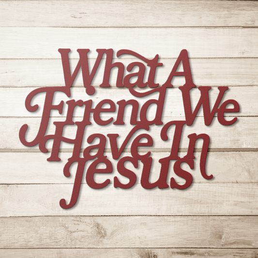 Metal_Cut_Sign_What_A_Friend_We_Have_In_Red_Simple_Wood_BKGD_Mockup.png